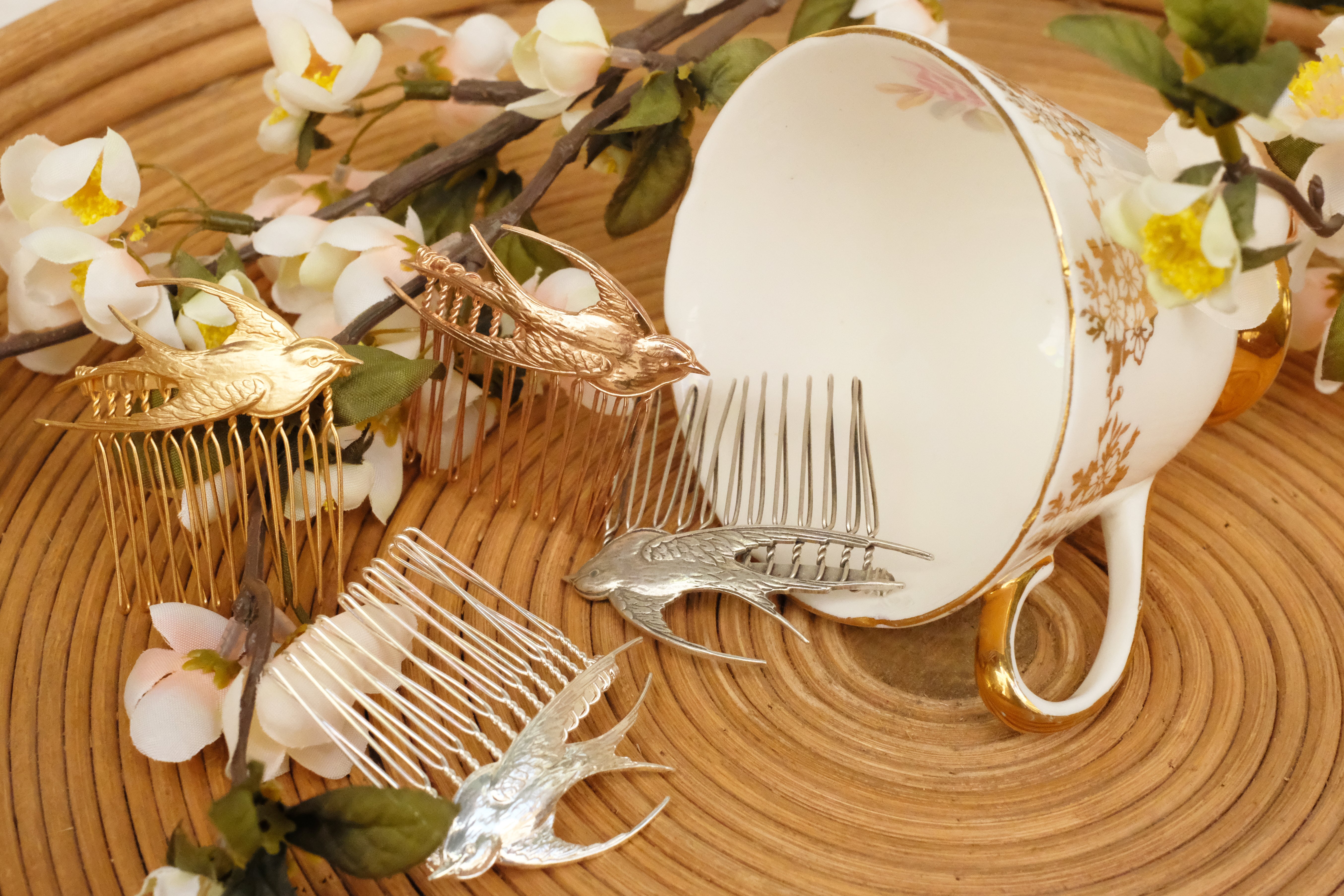 small hair comb with flying bird detail. in rose gold and silver plated