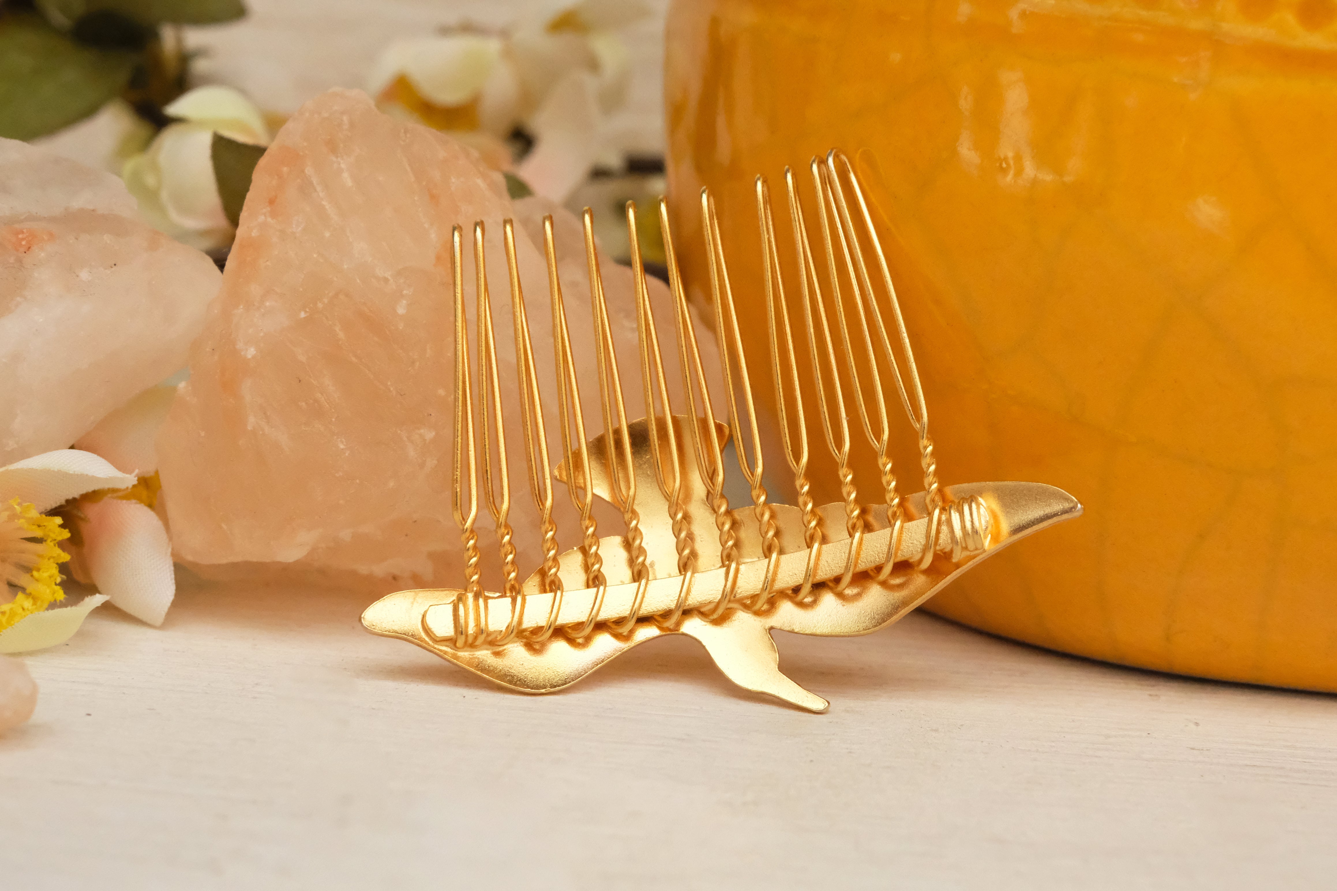 small hair comb with abstract bird detail. in gold plated and silver plated. 