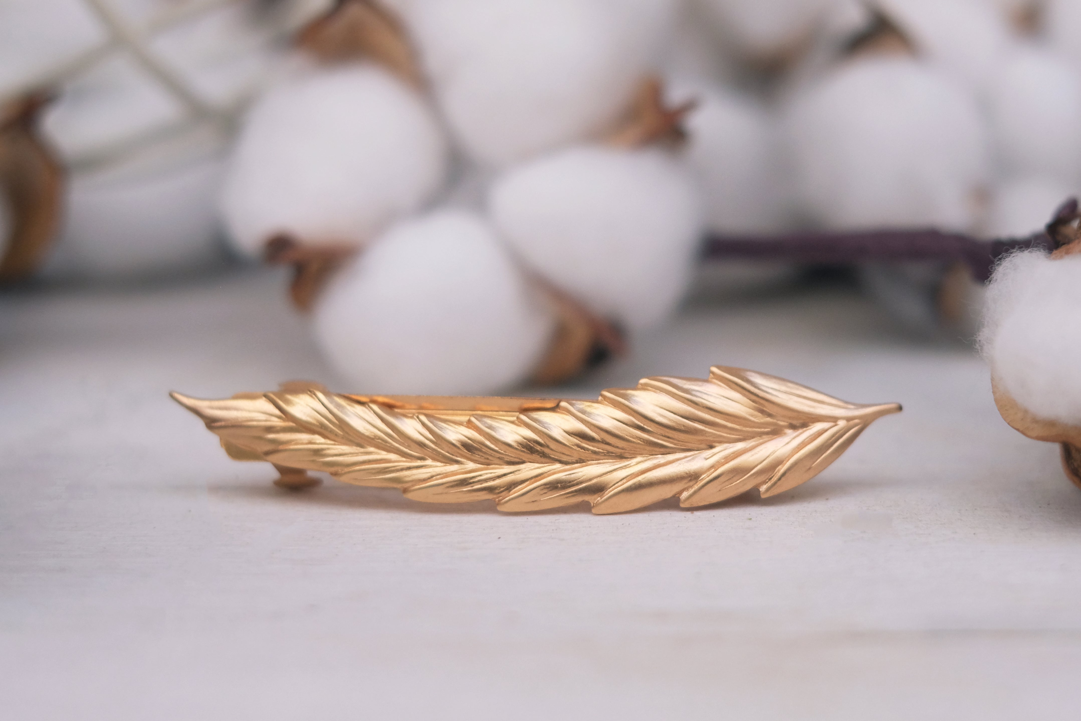 oats detailed small barrette in rose gold silver plated oxide silver and gold plated. 