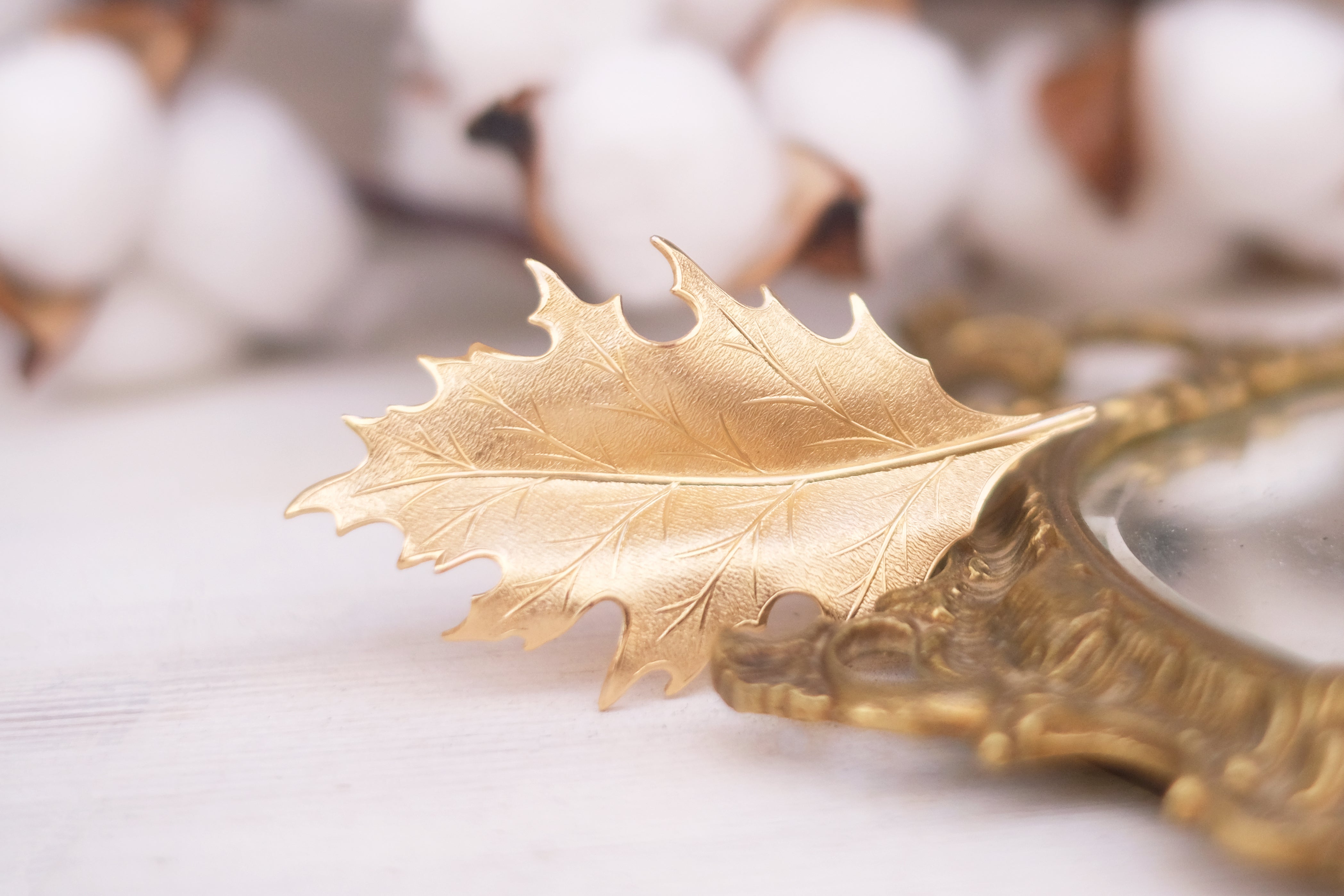 leaf detailed small barrette in gold plated rose gold and oxide silver