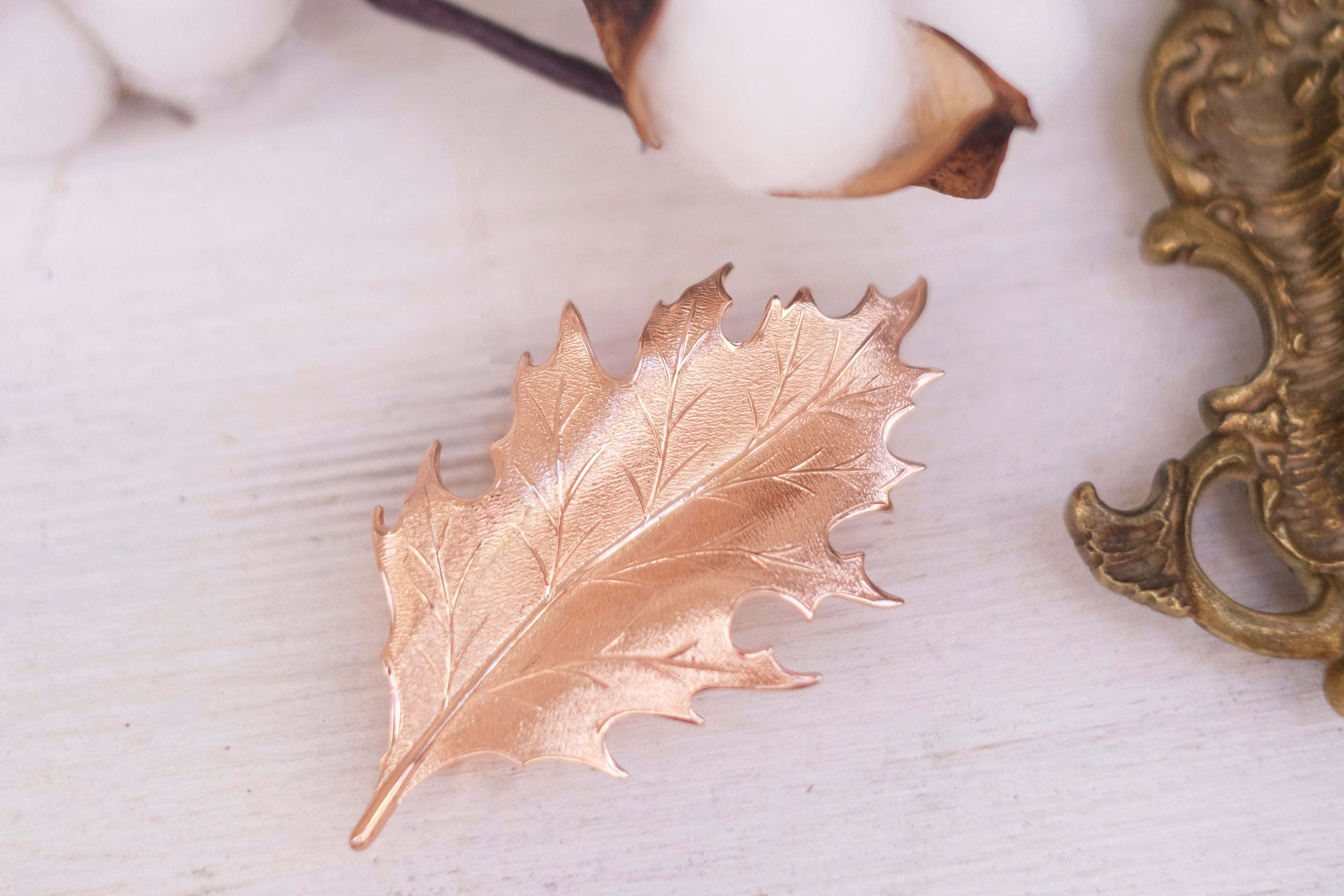 leaf detailed small barrette in gold plated rose gold and oxide silver