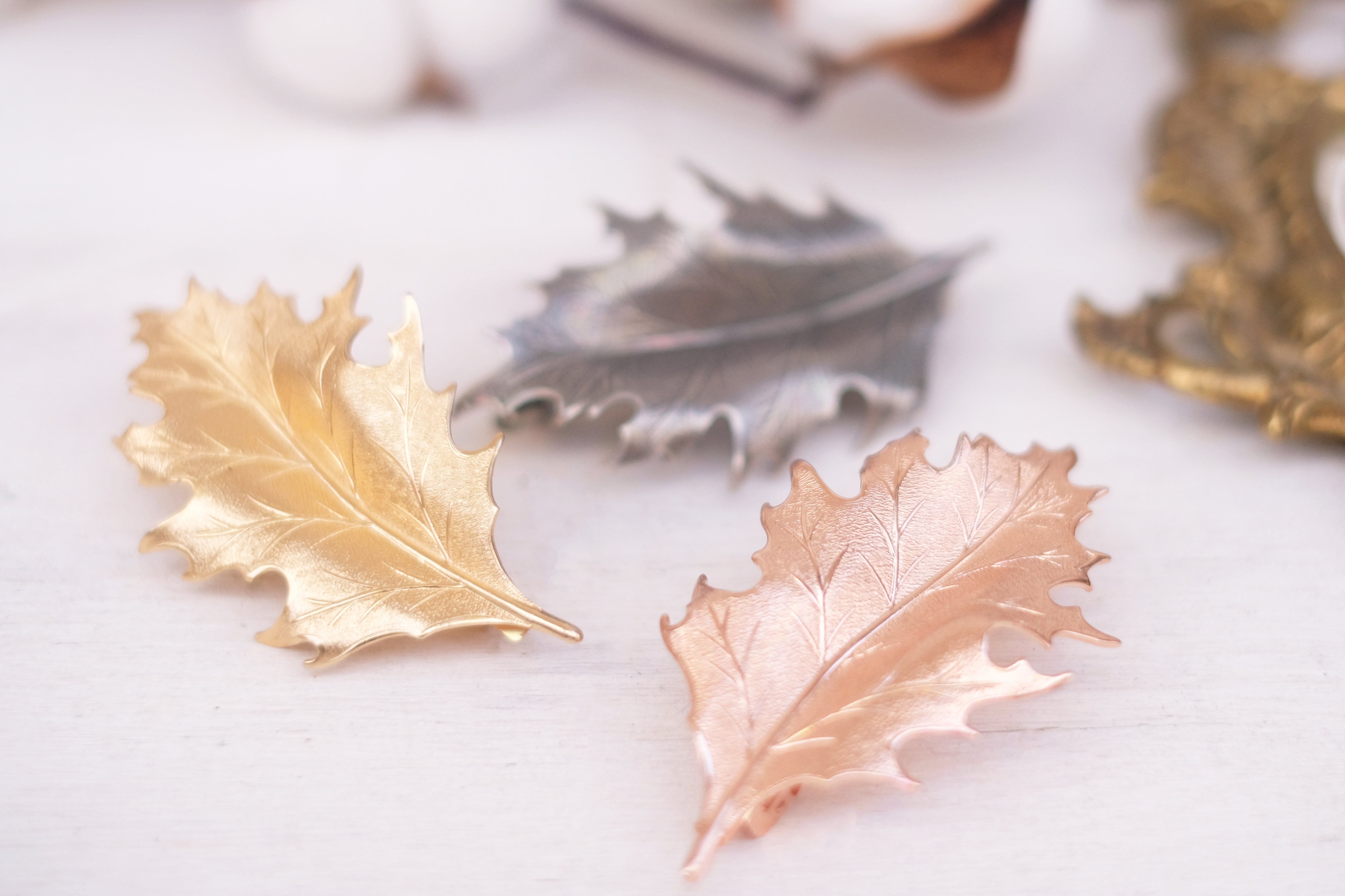 leaf detailed small barrette in gold plated rose gold and oxide silver