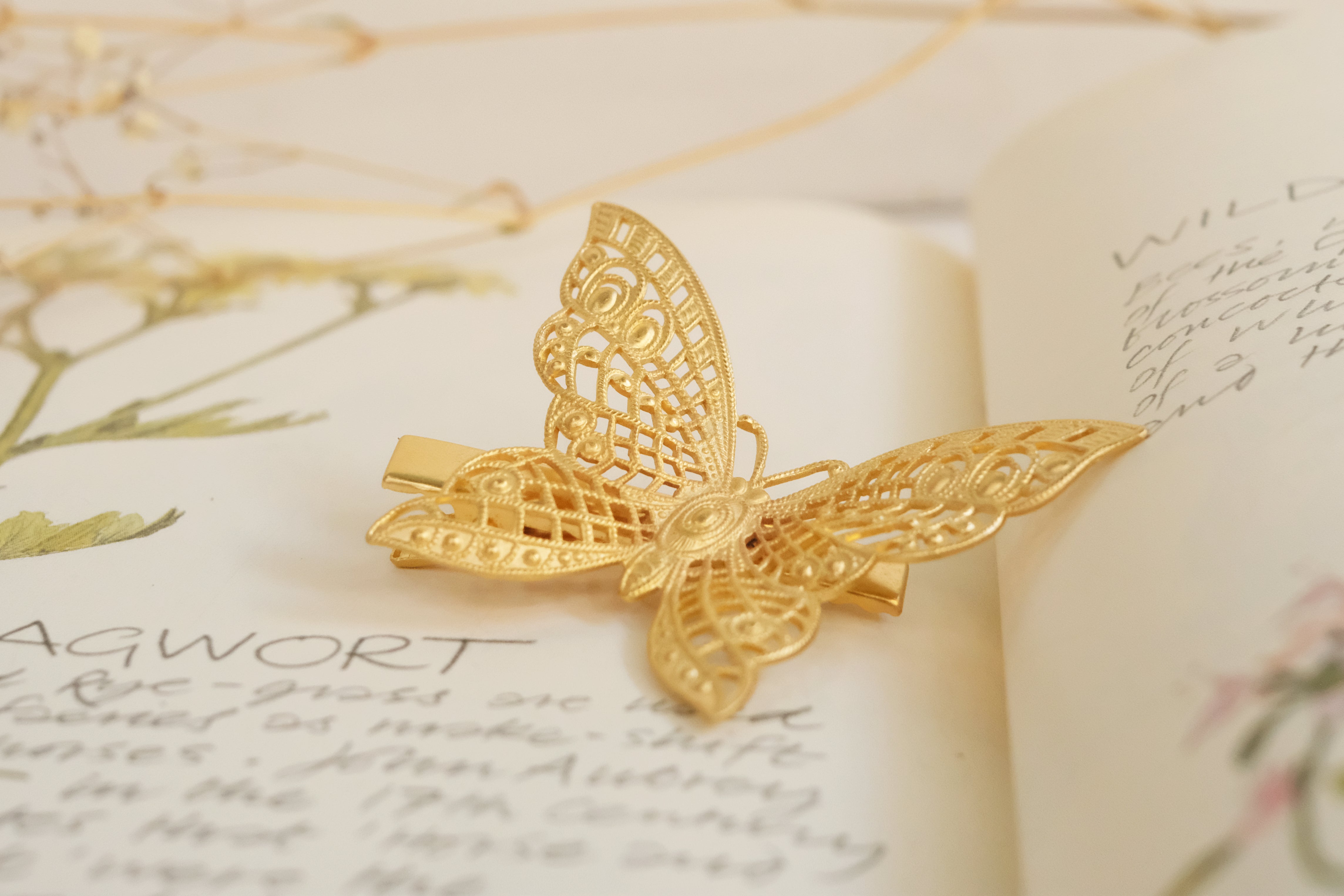 butterfly detailed square claw clip in gold plated silver plated rod gold and oxide silver. 